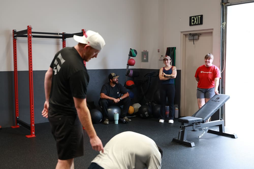 Students training together in the NPTI gym